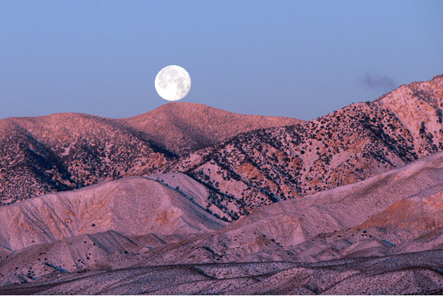 Moonrise over Light Snow
