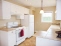Updated kitchen with gas stove, refrigerator and dishwasher no image