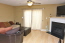 Living room: New bamboo flooring throughout living area. no image