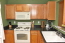 Kitchen: New granite countertops in kitchen. no image